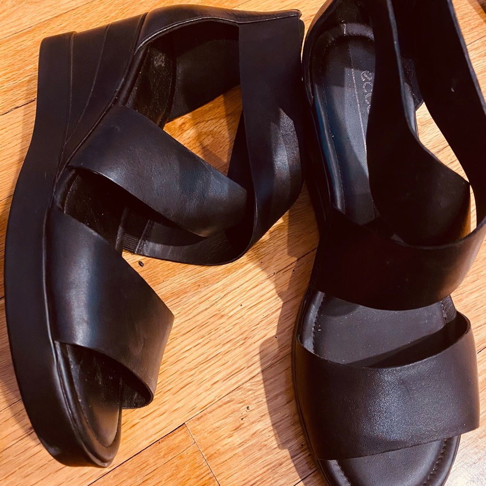 Ecco comfy sandal with low wedge in black. About 2 1/2 inches.